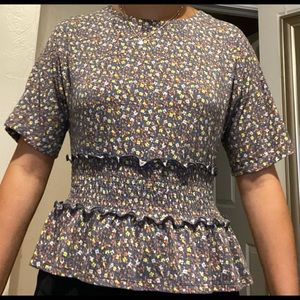 Floral short sleeve top with smocked waist